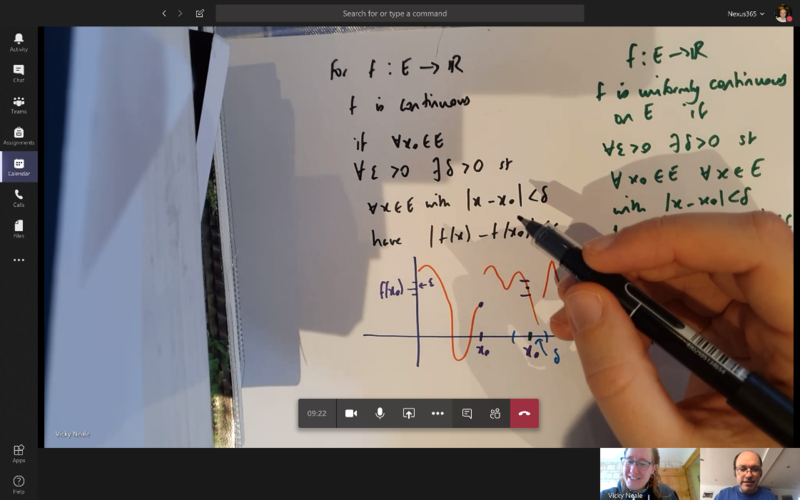 Screenshot of a mobile device being used to capture a problem-solving activity during a maths tutorial