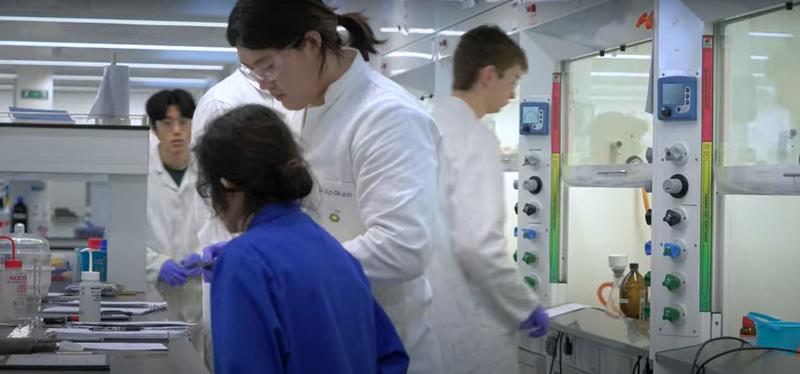 A group of students in a chemistry lab conducting experiments