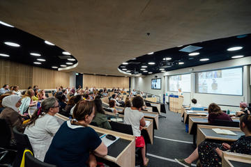 Photo of delegates listening to Dr Rachel Forsyth's keynote address