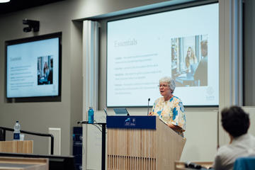 Photo of Dr Rachel Forsyth presenting her keynote address